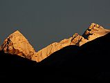 01 Nyanang Ri, Pungpa Ri and Shishapangma At Sunrise From Nyalam Nyanang Ri (7071m), Pungpa Ri (7445m) and Shishapangma (8012m) shine at sunrise from the Shisha Bangma Hotel in Nyalam.